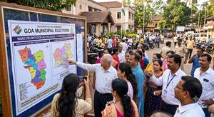 Citizens gathered around a Goa State Election Commission public display board in Panaji, reviewing maps and official notifications detailing ward delimitation for the 11 municipal councils.