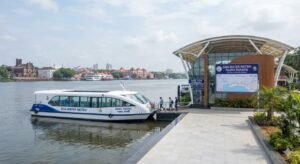 Modern hybrid-electric ferry docked at a passenger terminal for the Goa water metro project.