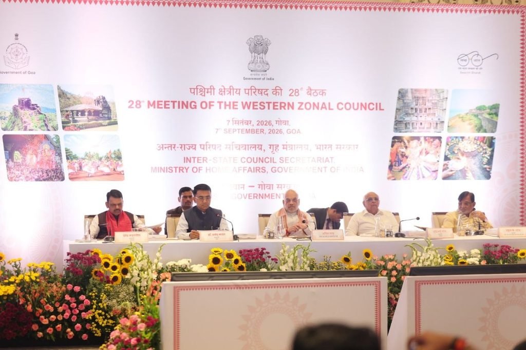 Union Home Minister Amit Shah, Goa Chief Minister Dr. Pramod Sawant, Maharashtra Chief Minister Devendra Fadnavis, Gujarat Chief Minister Bhupendra Patel, and other dignitaries seated on a floral-decorated stage during the 28th Meeting of the Western Zonal Council in Goa.