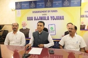 Goa Chief Minister Pramod Sawant seated at a conference table alongside Civil Supplies Secretary Sanjiv Gadkar and Director Jayant Tari, addressing a press briefing in front of a backdrop titled "Disbursement of Funds under Goa Ujjwala Yojana."